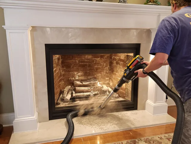 Fireplace cleaning performed by Kingston Chimney Sweep in Kingston, MA